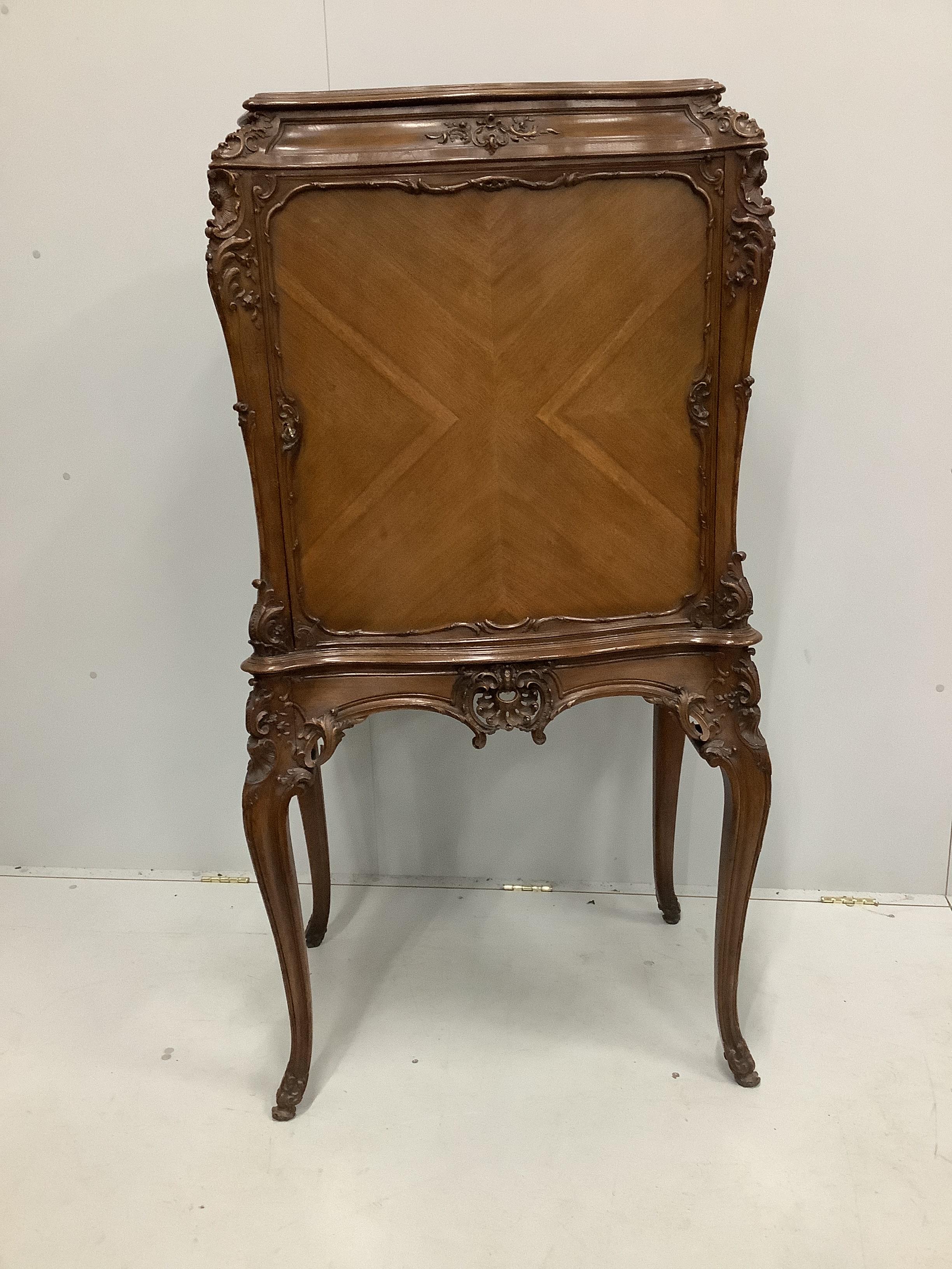 An early 20th century French mahogany side cabinet, width 74cm, depth 51cm, height 150cm